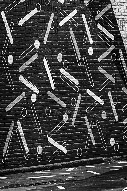 A mural of confetti shapes.