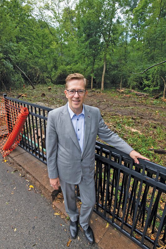 Martin Bouma standing in front of one of his lots.