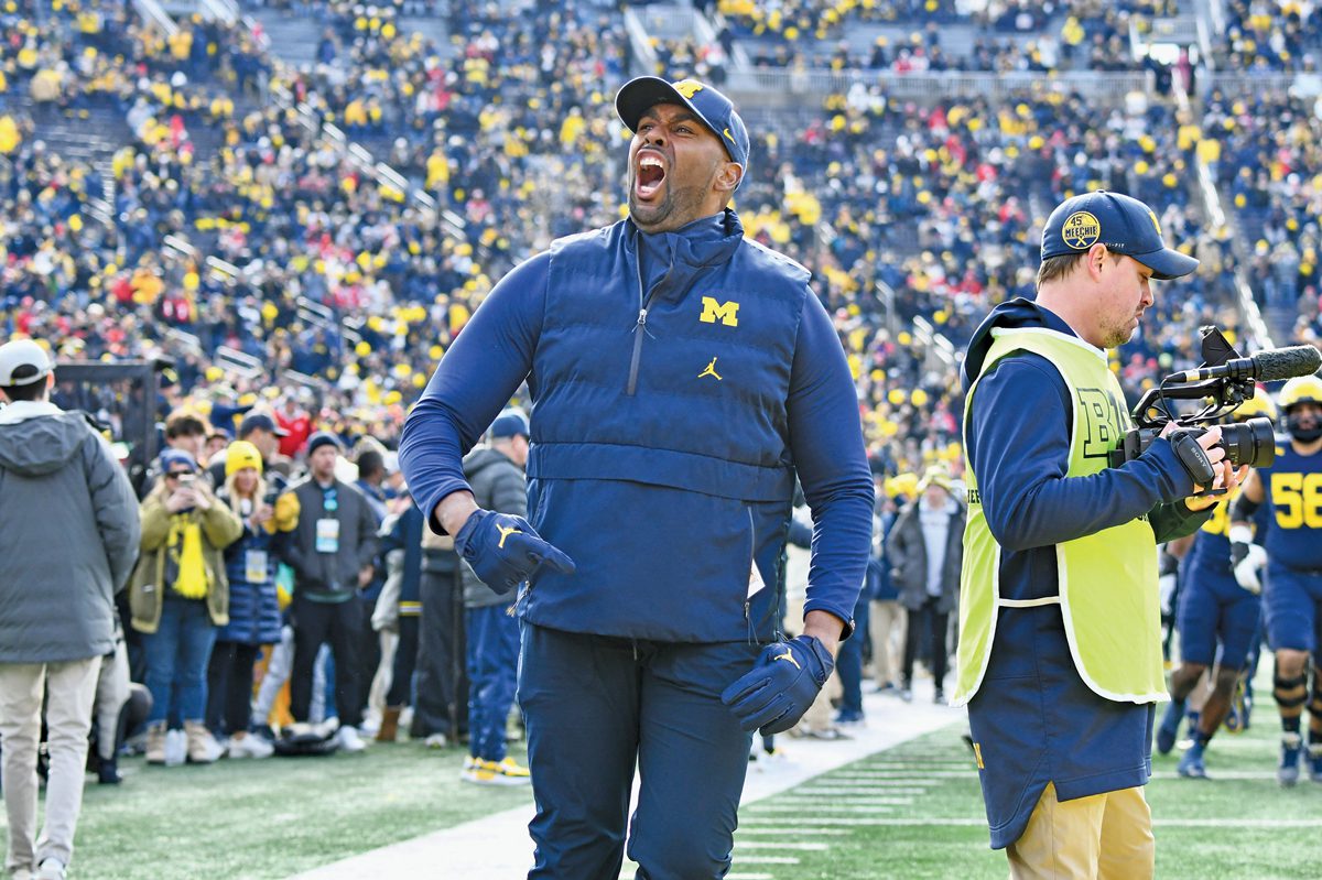 U-M football coach Sherrone Moore yelling during a game