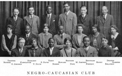 a black and white yearbook photo of thirteen people with their names and the text Negro-Caucasian Club