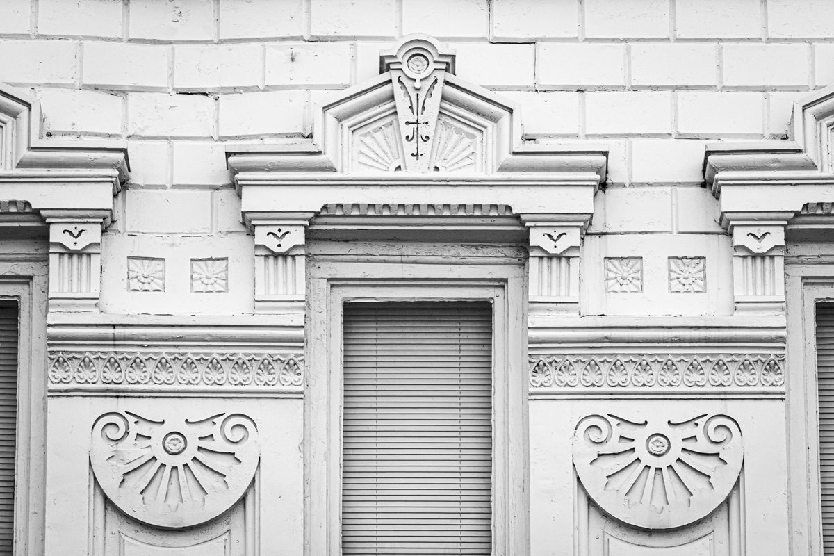 a black and white photo of the exterior of a building.