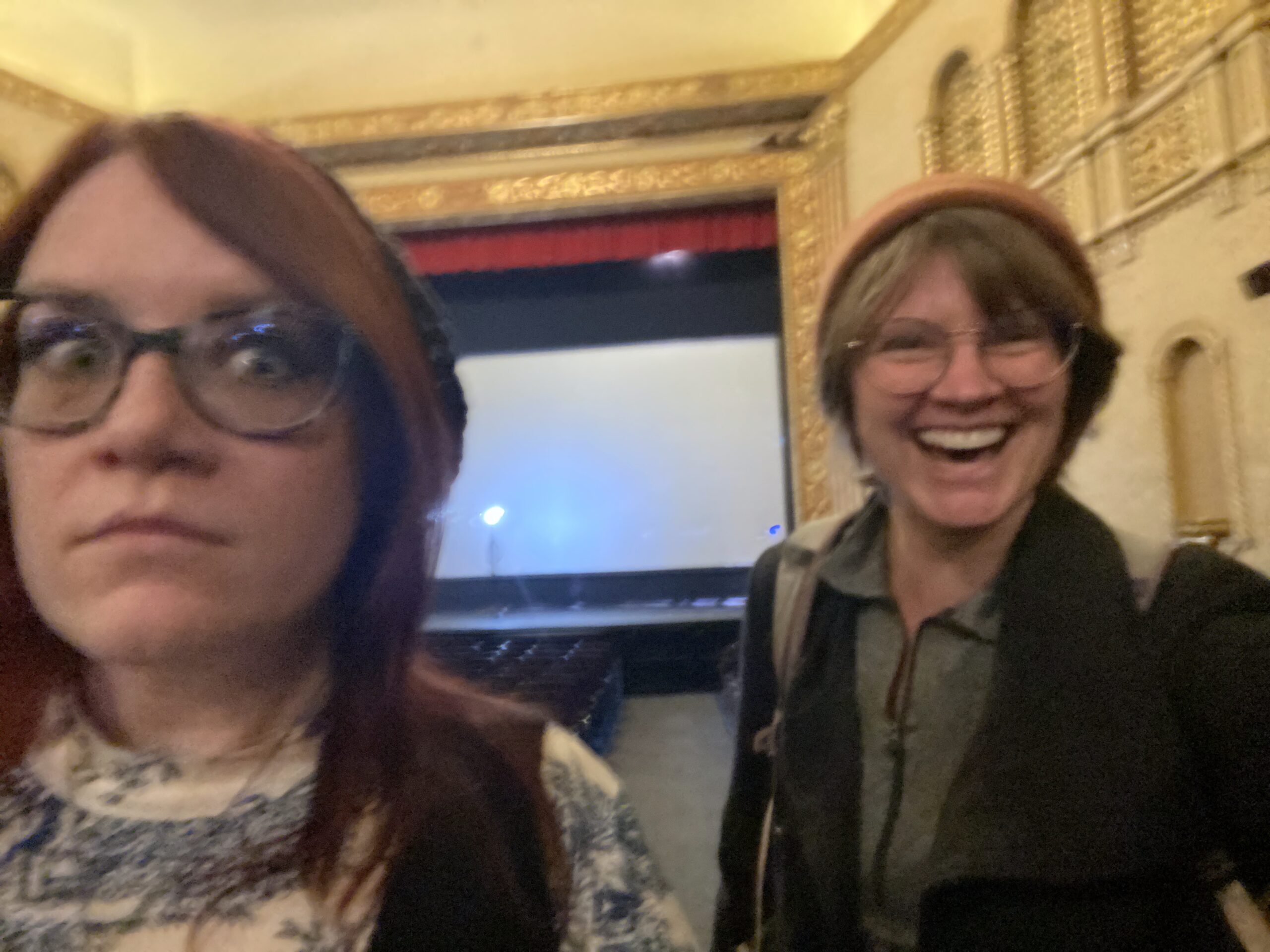 Two women in a movie theater
