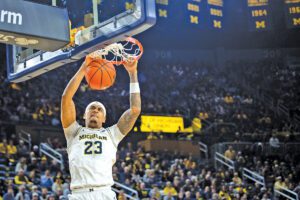 Yaxel Lendeborg dunks a basketball