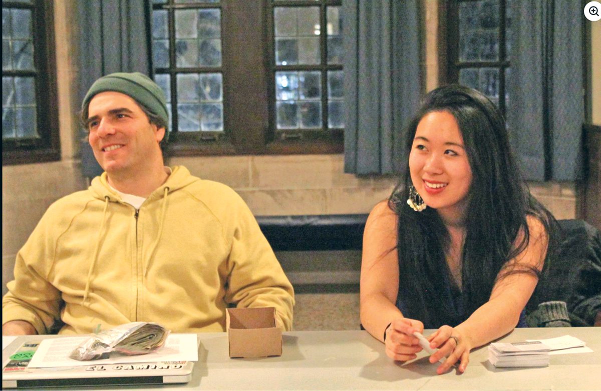 Jeff Kass and Carlina Duan sitting at a table.