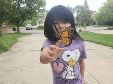 child with butterfly
