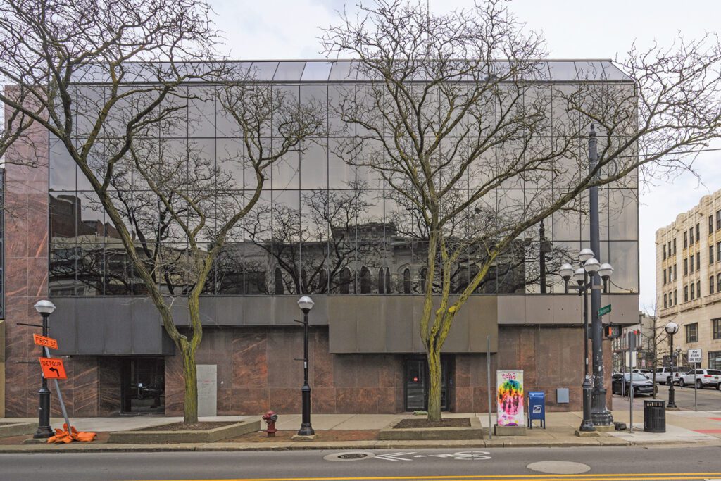 The exterior of a glass-walled building