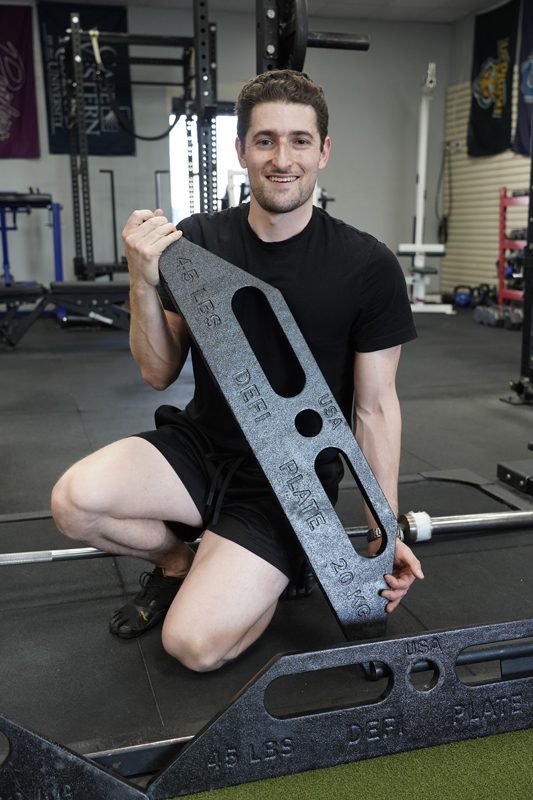 Jake Ciolino holding DefiPlate