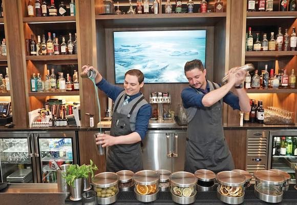 bartenders mixing drinks