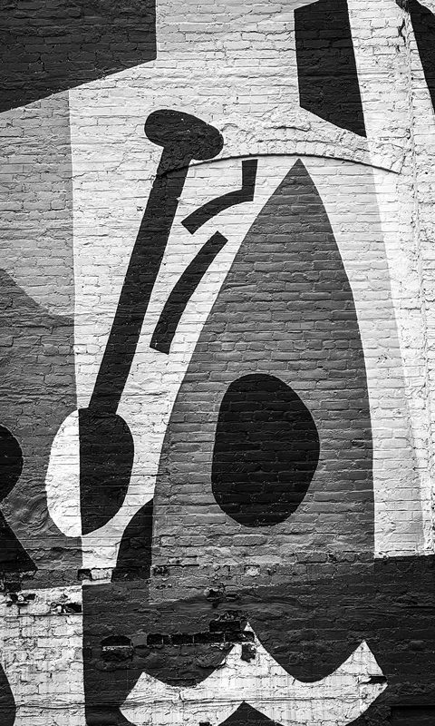 Black-and-white photo of a mural