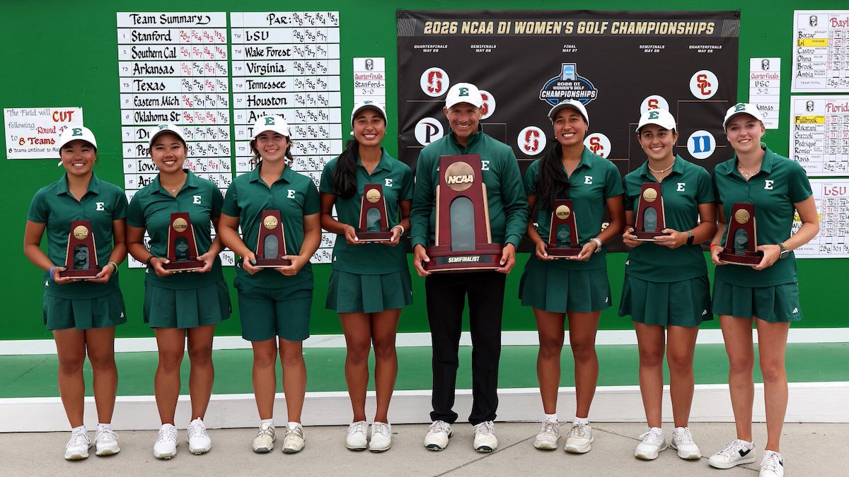 people holding trophies