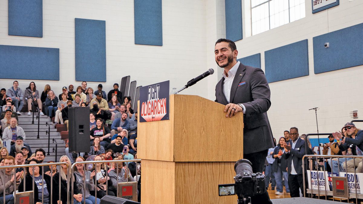 Abdul El-Sayed speaks at a podium at a campaign event