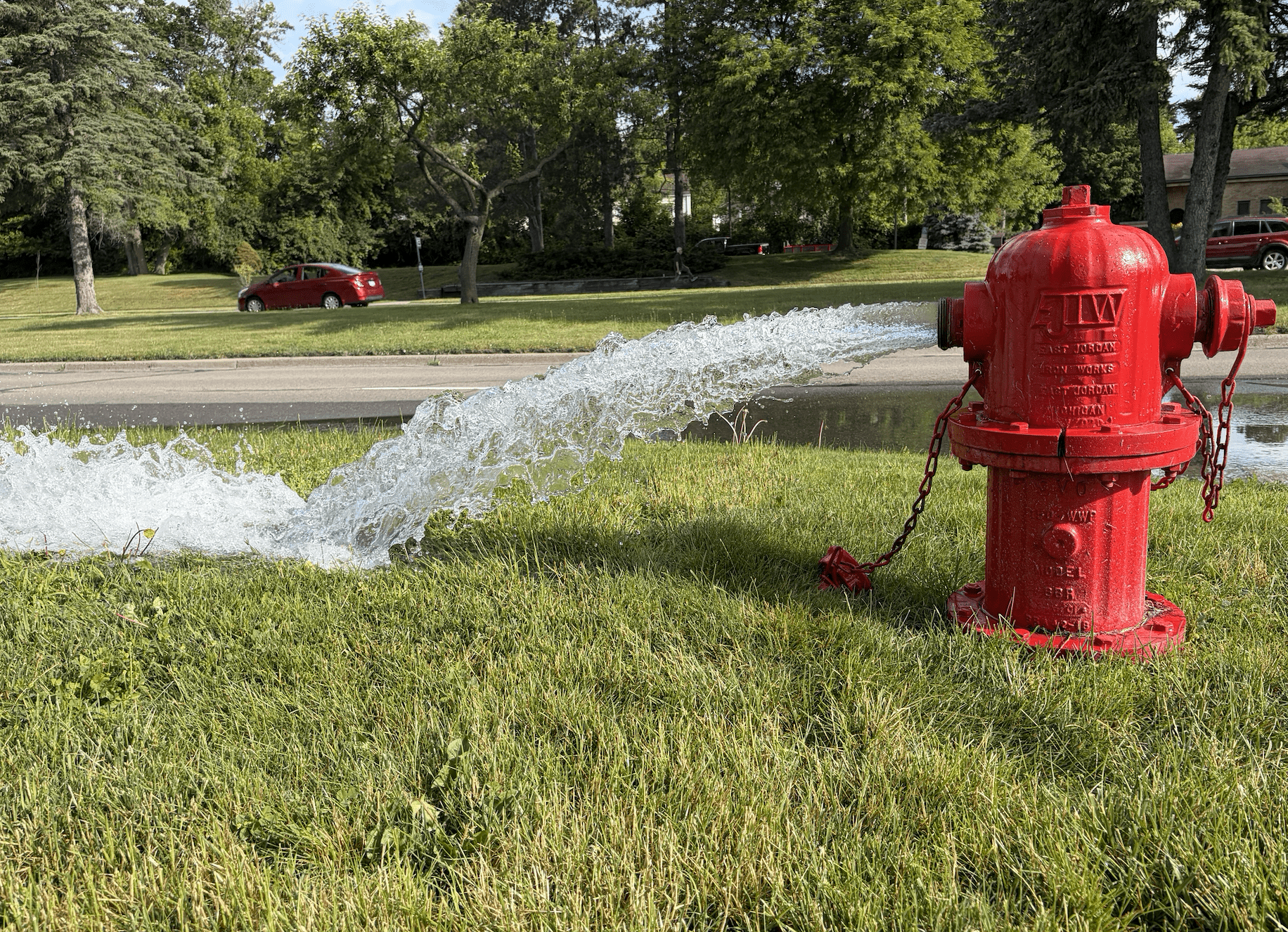 fire hydrant spewing water