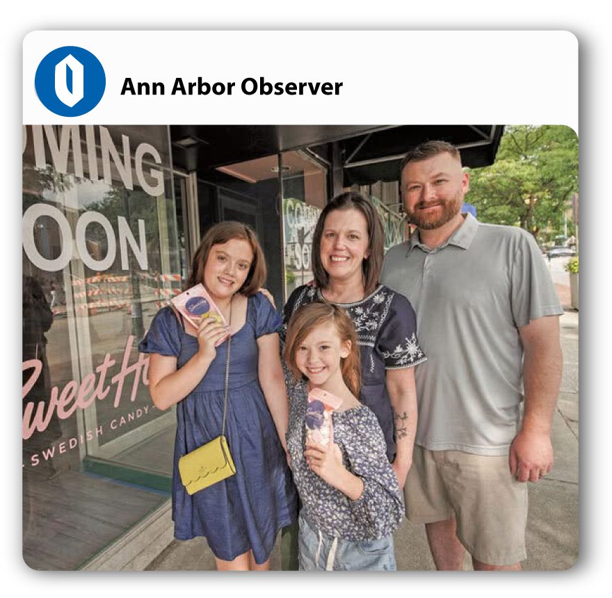 family outside store